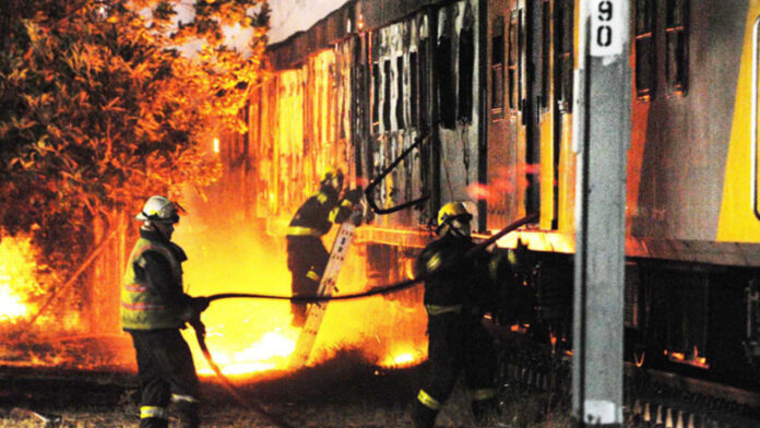 TRAIN COLLIDES WITH TANKER